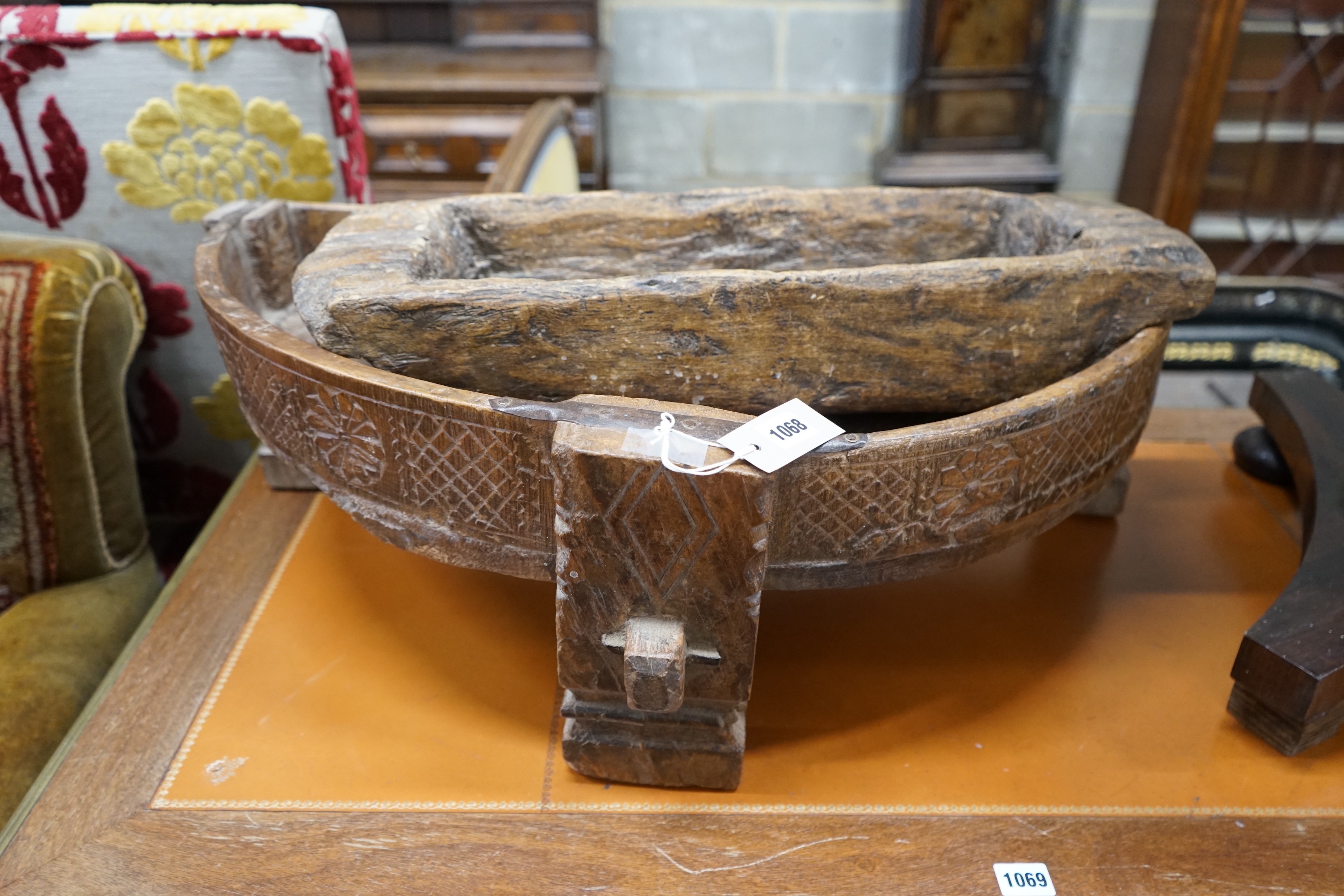 An Afghan D shaped chip carved mazer and one other, larger width 80cm, depth 40cm, height 27cm